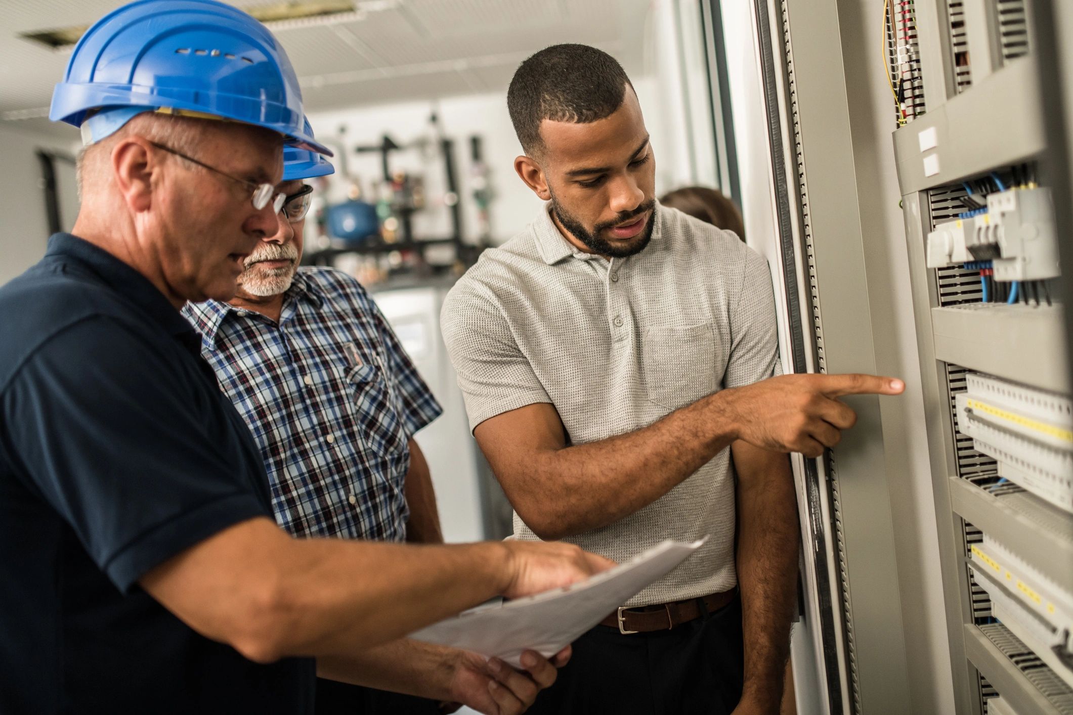 Professionals discussing technical details